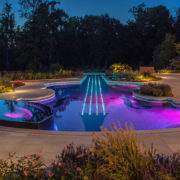 interesting design exterior landscape lighting ideas violin shape swimming pool blue purple colors led lights under water stone walkway upper lights garden lamps pretty garden exterior landscape ligh